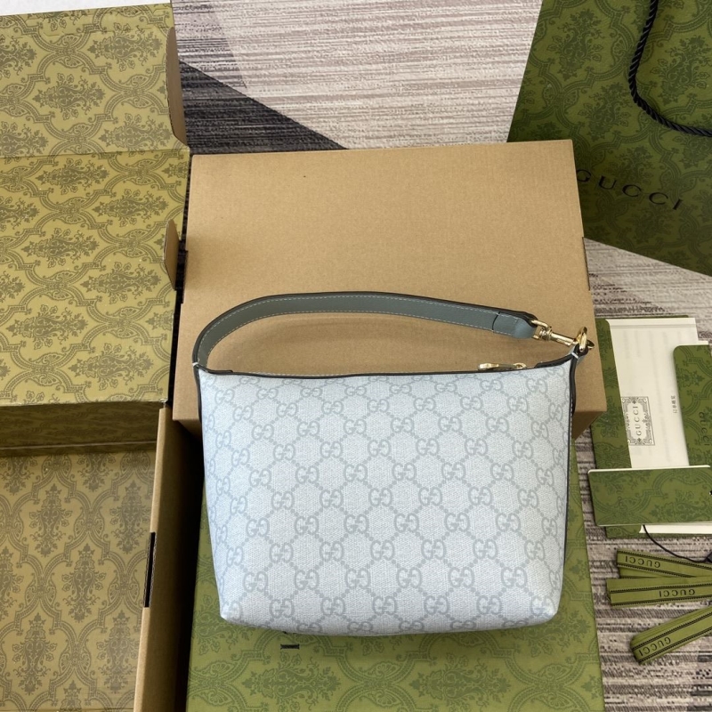 G*u*i top handle bags